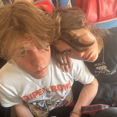 Dante Amadeo Meloni and his sister Sophia Meloni taking a selfie.